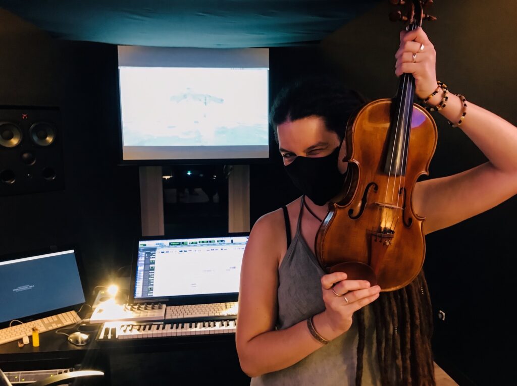Violinist recording in the studio